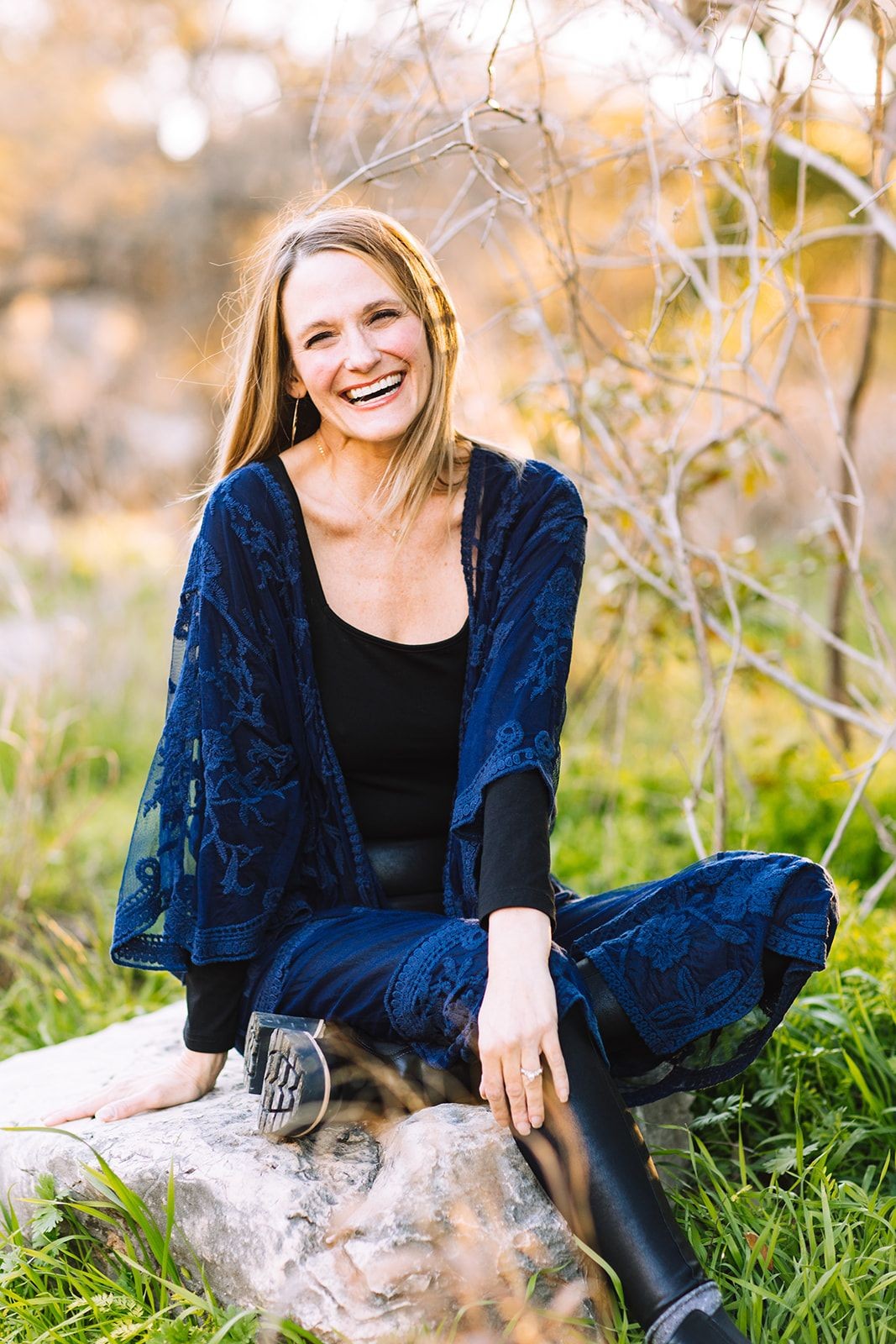 Pure joy! Laughing out loud on a rock, soaking up the beauty of nature.